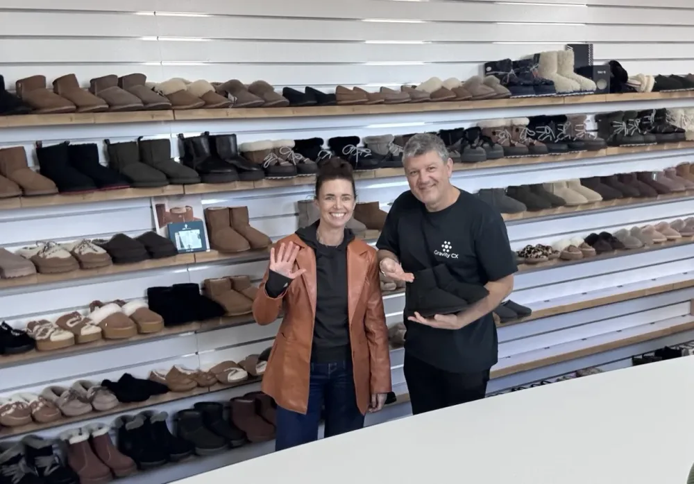 On site with the EMU Australia team, in front of a wall of EMU boots